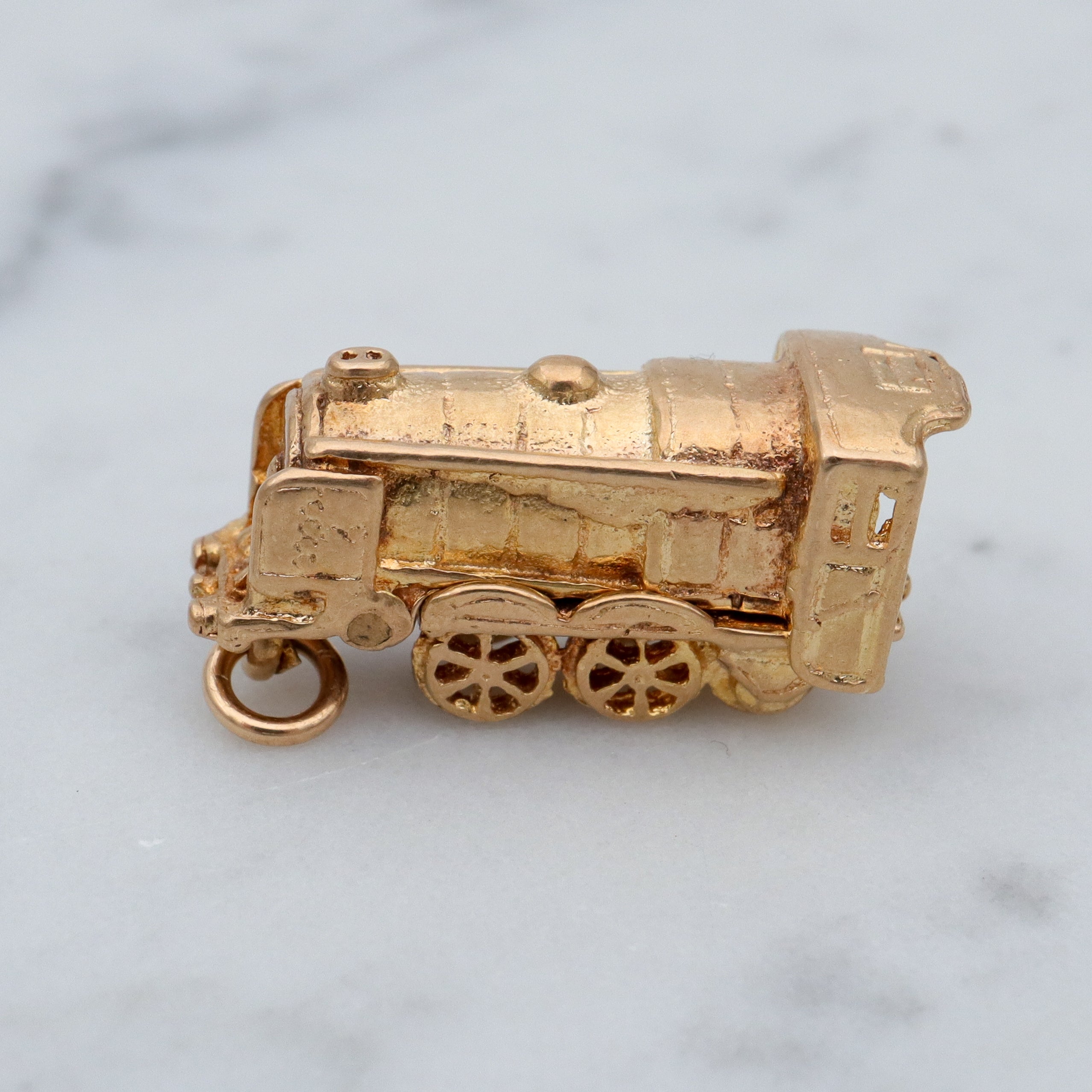 Vintage English 9k gold opening “Bon Voyage” locomotive charm